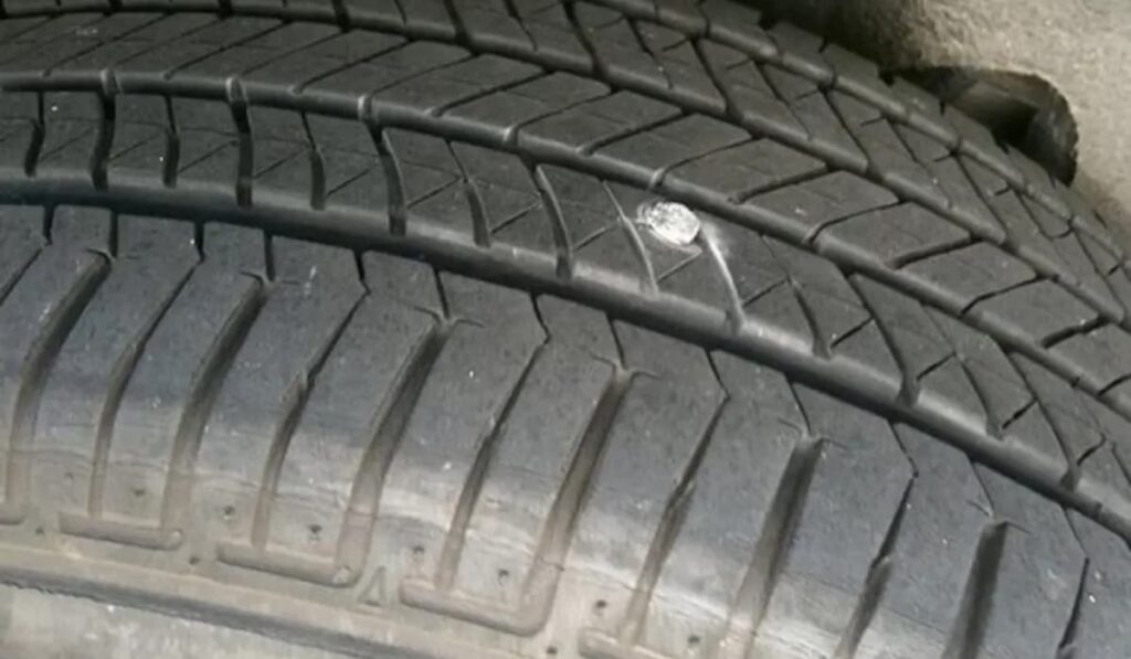 nail in my tire but not flat 